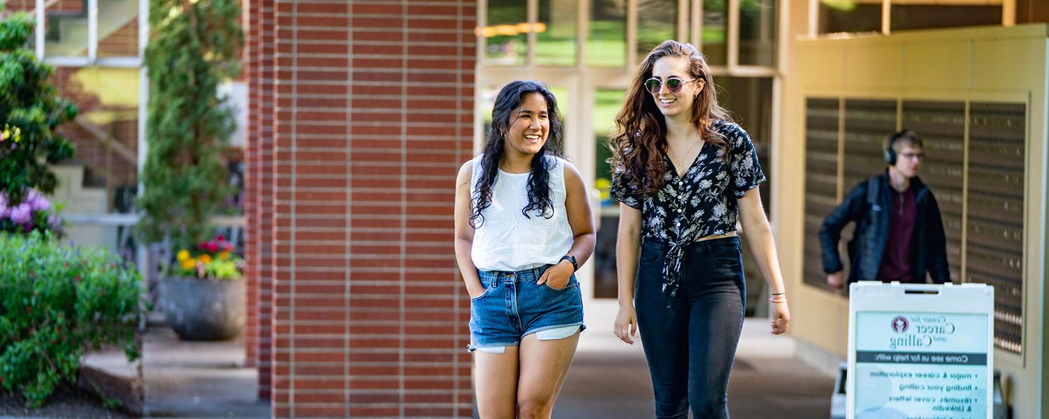 Two young women touring Seattle Pacific University